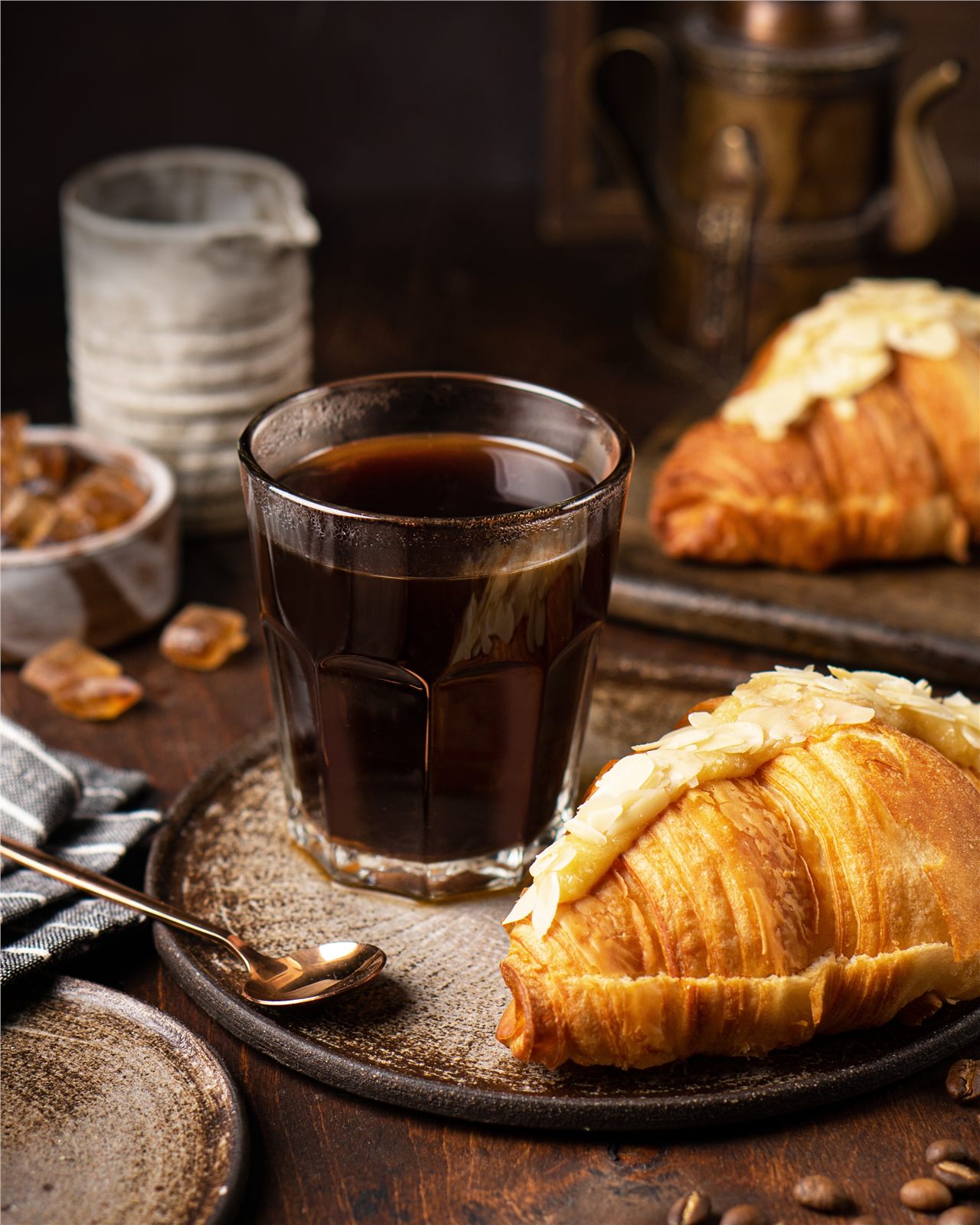 Coffee and croissants on a wooden table