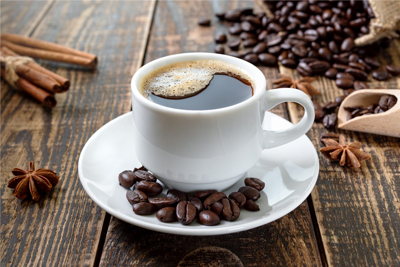 A fresh cup of coffee with star anise